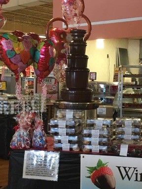 chocolate fountain at super market, grocery stores, food chain, chocolate fountains produce promo events